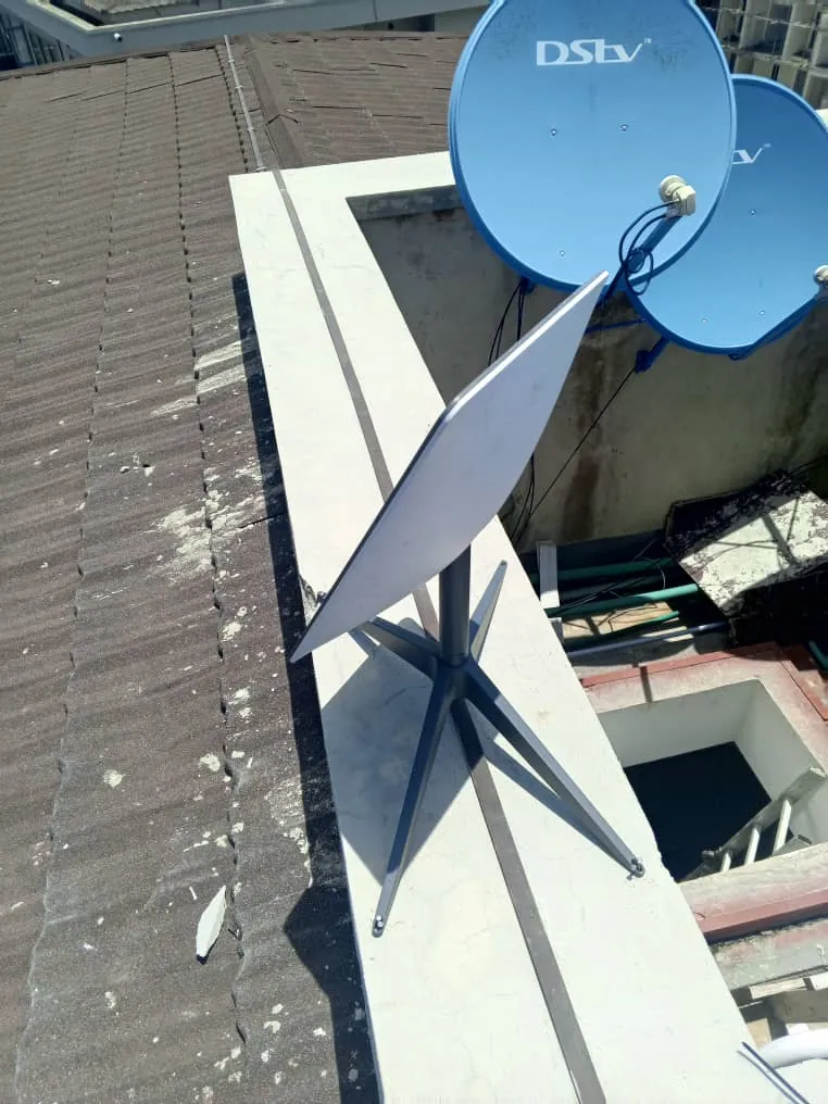 Starlink dish next to the DStv dishes on the parapet