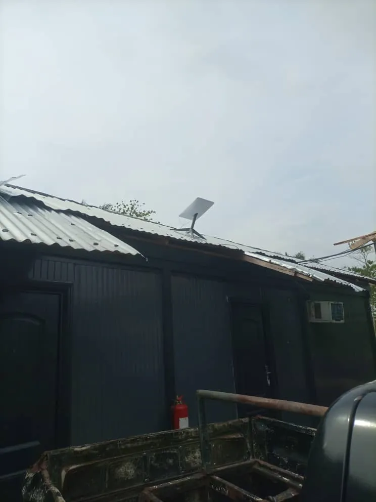 Starlink dish on the roof of a container site office