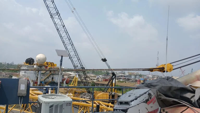Upper deck of the crane barge with the Starlink dish clear of the crane boom