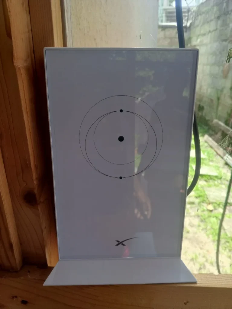 Starlink router placed by the window