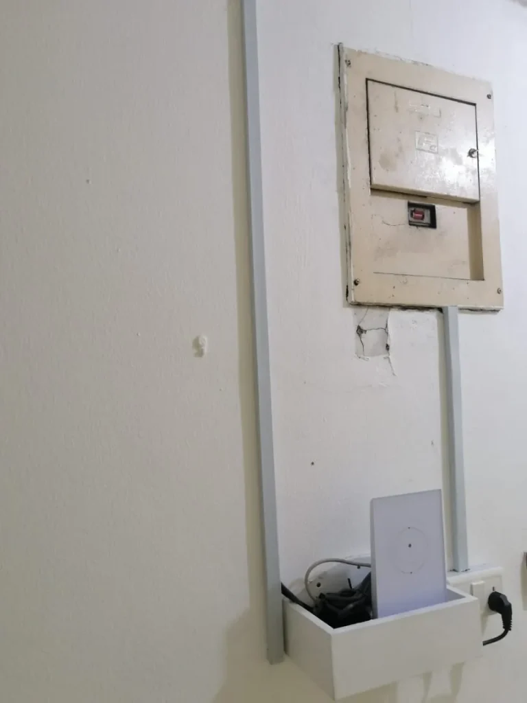 Starlink router fitted in a wall box under the distribution board
