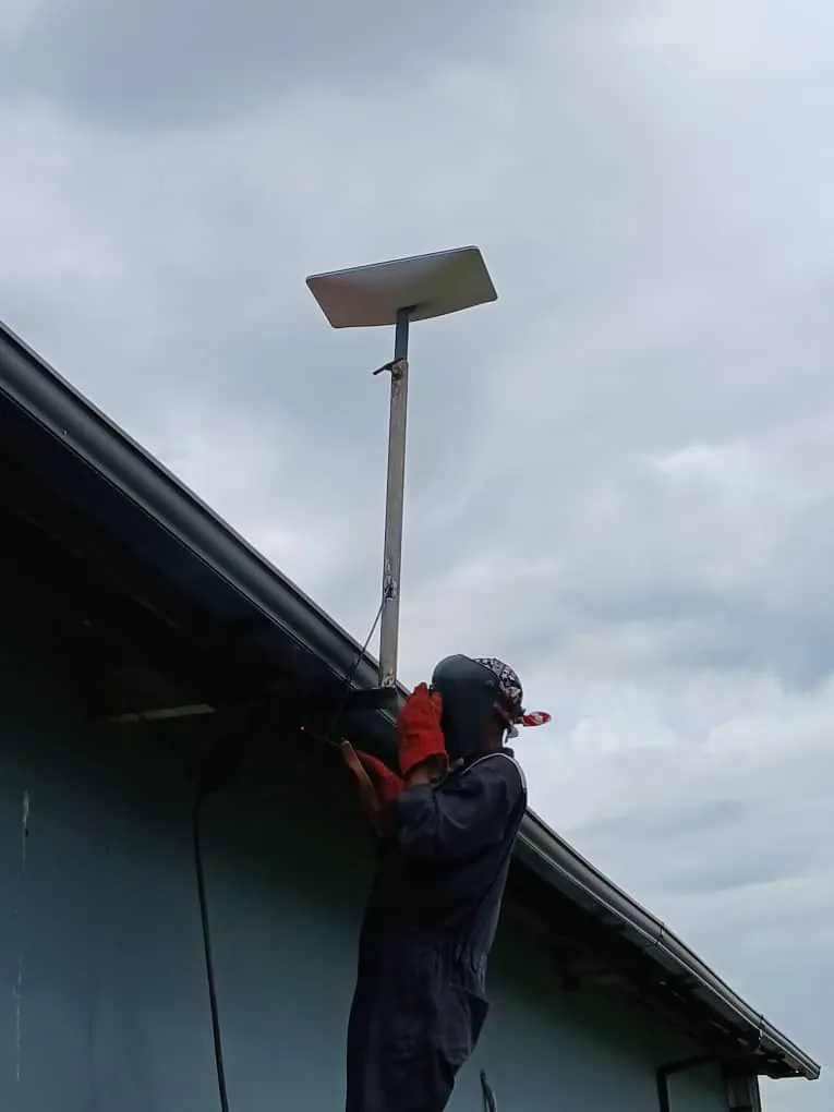 Starlink dish on the welded pole above the roof line