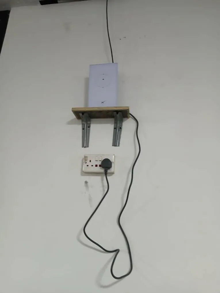 Starlink router and cabling on the wall