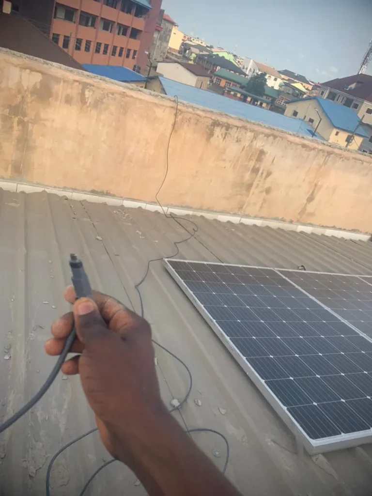 Starlink cable routed past the solar panel on the metal roof