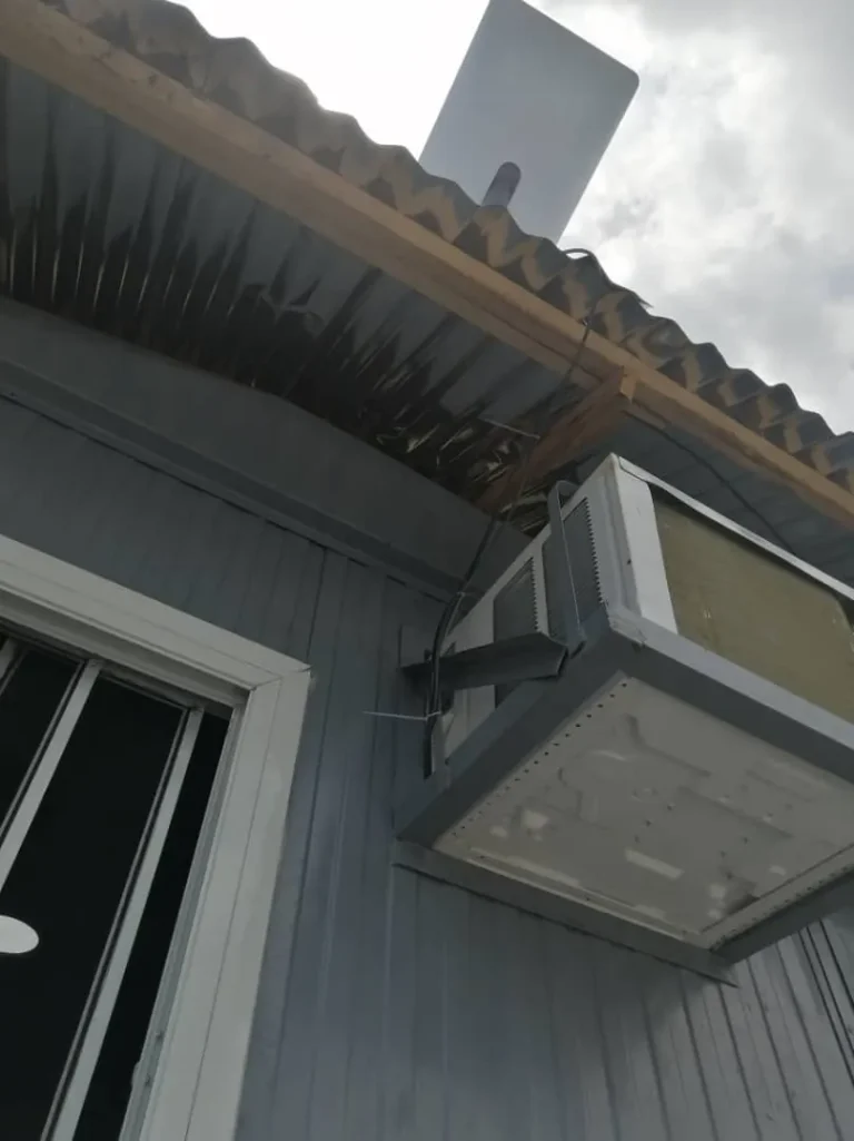 Starlink dish and bracket at the cabin roof